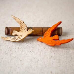 Broche vintage de plástico tallado